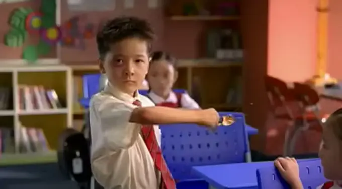 Source: official_studio_trailer frame.
Classroom scene from CJ7