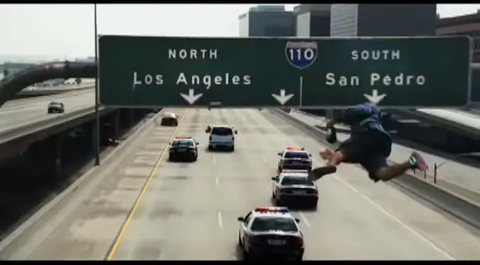 Will Smith as Hancock in a freeway action scene