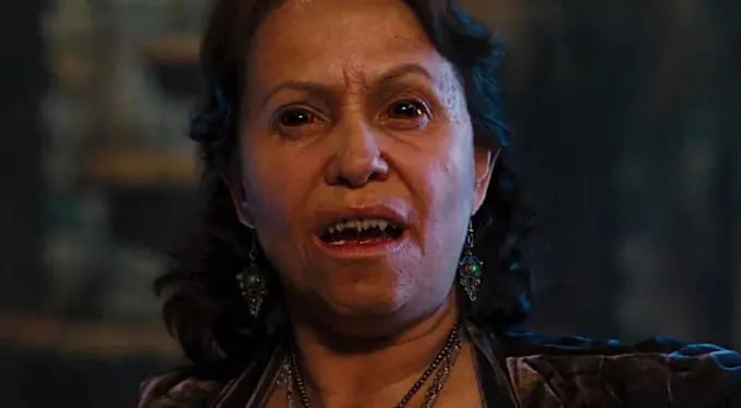 Adriana Barraza close-up speaking intensely in Drag Me to Hell scene