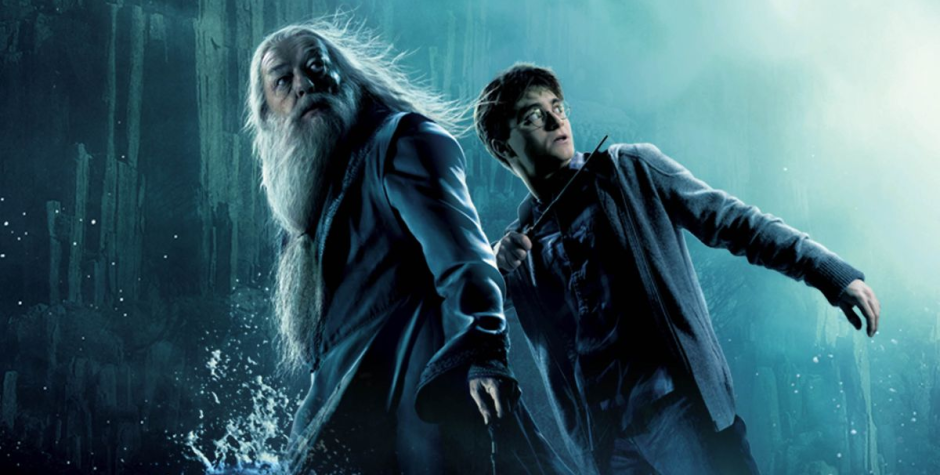 Dumbledore and Harry Potter brace for danger in a blue-lit cave