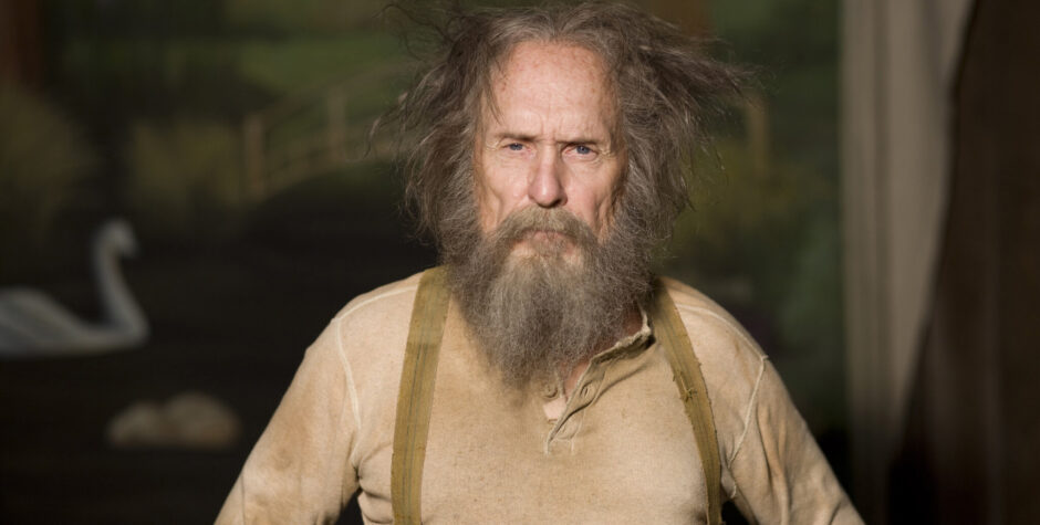 Robert Duvall with beard and disheveled hair in period costume