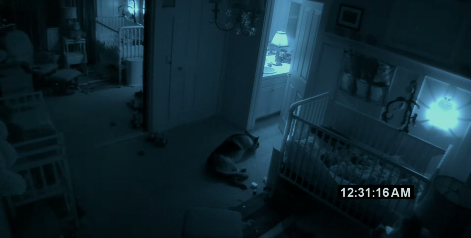 Paranormal Activity 2 nursery scene with crib and dog from official trailer