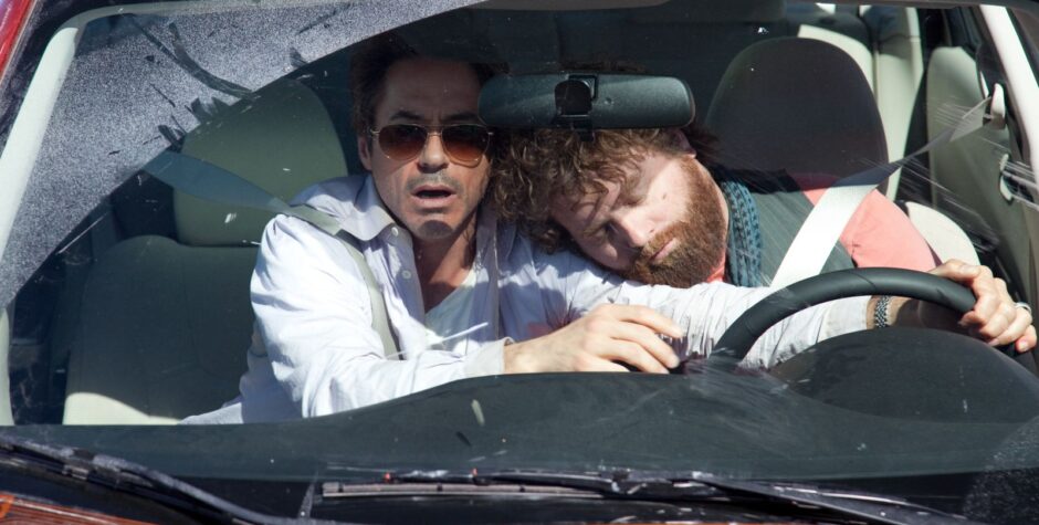 Robert Downey Jr. and Zach Galifianakis in car, one asleep on shoulder