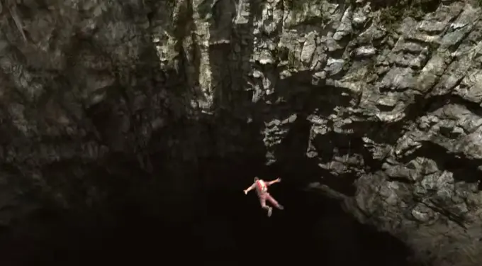 A cave diver descends inside a cavern in a scene from Sanctum official Universal Pictures trailer