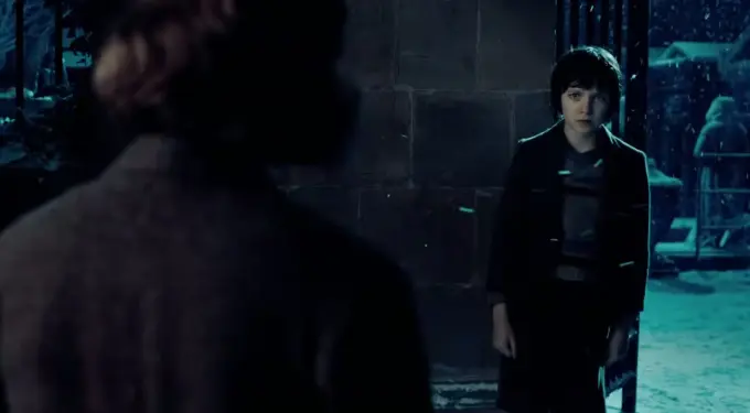 Asa Butterfield as Hugo in a snowy scene from the official Paramount Pictures trailer for Hugo