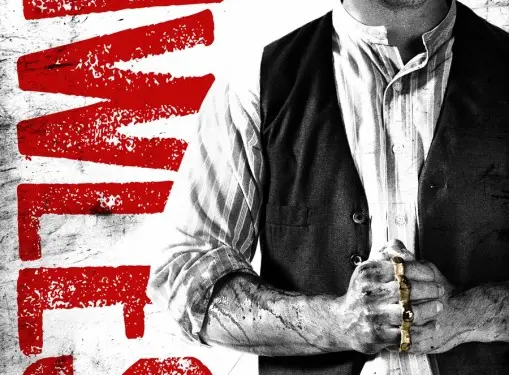 Tom Hardy in Lawless poster wearing hat and holding brass knuckles