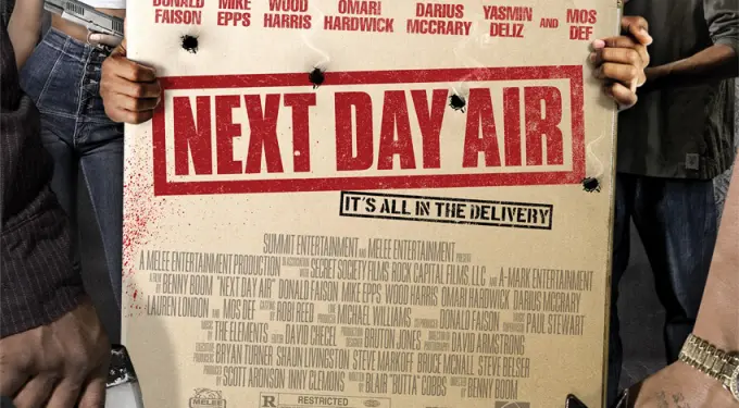 Next Day Air movie box held by five armed characters in gritty hallway