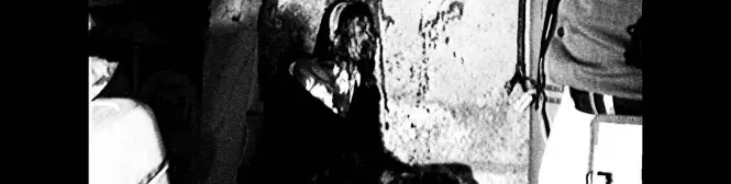 distorted woman sitting in dark room, horror movie scene