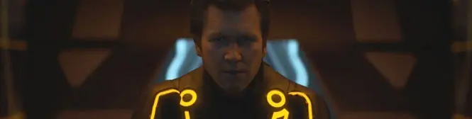 man in glowing yellow futuristic suit in dark sci-fi setting