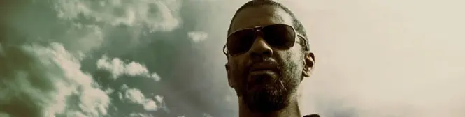 close-up of a man wearing sunglasses with cloudy background