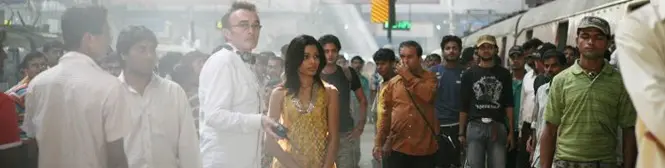 crowded urban street scene with people walking amid traffic