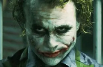 The Joker in iconic makeup from the 2008 film ‘The Dark Knight.’
Close-up of the Joker with messy face paint and sinister smile
