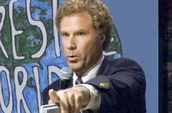 Will Ferrell points while speaking into microphone at event
