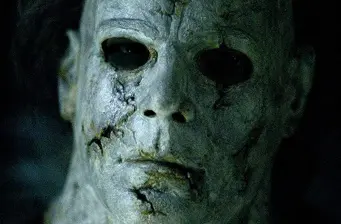 Close-up of cracked Jason Voorhees mask from horror movie