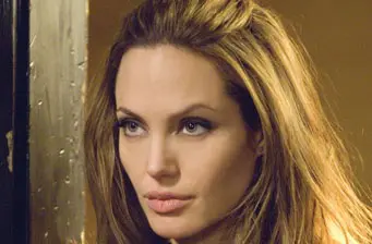 Angelina Jolie close-up with serious expression in film scene