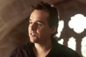Chris Columbus headshot from a film scene with soft lighting