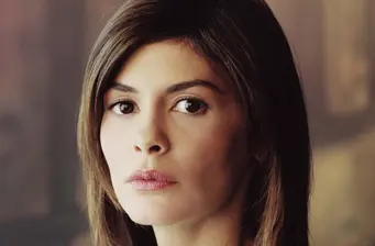 Audrey Tautou close-up headshot with neutral expression