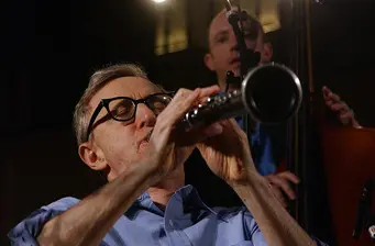 Woody Allen playing clarinet on stage during Spain performance