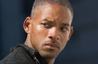 Close-up of Will Smith looking serious to the side