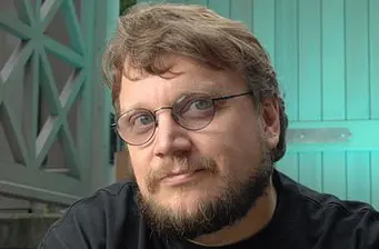 Headshot of Mexican filmmaker Guillermo del Toro indoors