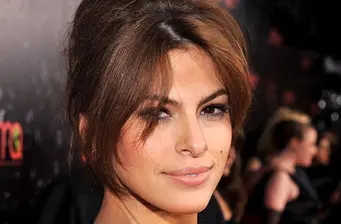 Close-up headshot of a woman with light brown hair and soft makeup