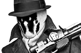 Rorschach in mask holding gun in close-up from Watchmen