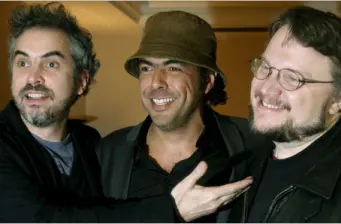 Mexican directors Cuarón, Iñárritu, and del Toro together smiling