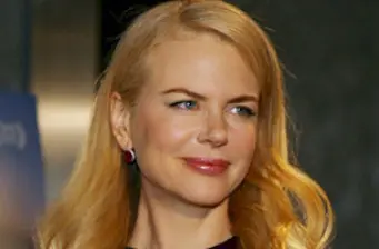 Headshot of Nicole Kidman smiling with long blonde hair