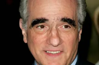 Close-up headshot of director Martin Scorsese smiling