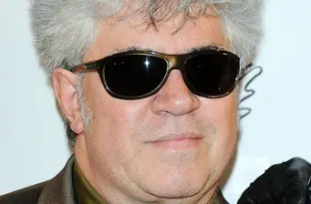 Headshot of filmmaker Pedro Almodóvar wearing sunglasses