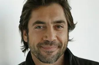 Headshot of Spanish actor Javier Bardem smiling