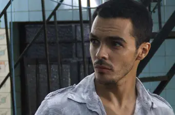 Headshot of Puerto Rican actor Shalim Ortiz filming in Mexico