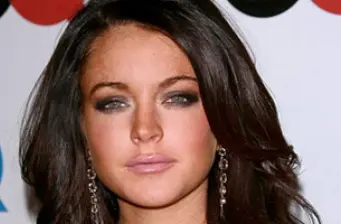 Close-up headshot of Lindsay Lohan with smoky eye makeup