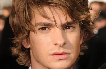 Andrew Garfield close-up headshot with tousled hair