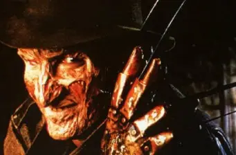 Close-up of Freddy Krueger with burned face and glove