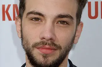 Close-up headshot of actor Jay Baruchel looking at camera