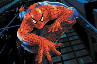 Spider-Man in classic suit crouching on skyscraper at night