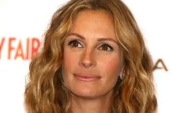 Headshot of Julia Roberts with wavy hair looking off-camera