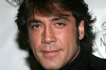 Close-up headshot of Spanish actor Javier Bardem looking at camera