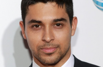 Close-up headshot of a man with short hair and trimmed beard