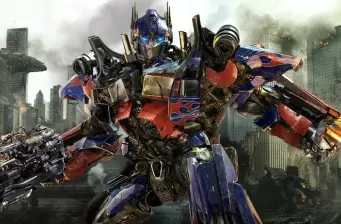 Optimus Prime ready for battle in city ruins from Transformers movie