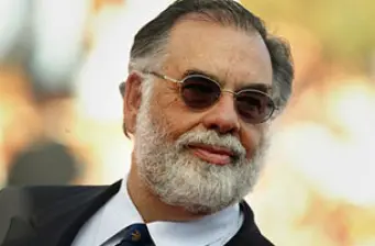 Francis Ford Coppola wearing sunglasses outdoors with beard