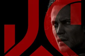 Close-up face of a man with red graphic letters in background