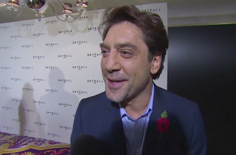Javier Bardem speaks in an interview on 'Skyfall' backdrop
