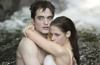 Edward and Bella in a tense embrace in water from Twilight