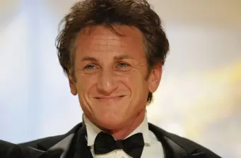 Sean Penn close-up wearing tuxedo and black bow tie