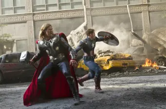Thor and Captain America in superhero battle on city street