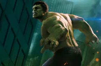 Hulk rearing back to punch in a dark city environment