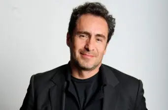 Headshot of Mexican actor Demían Bichir wearing black jacket