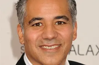 Headshot of Puerto Rican-American actor John Ortiz smiling